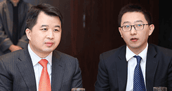 Xia Zhu (l), senior marketing manager from AsiaPay, with Xudong Zeng, manager for sustainability and community engagement at Standard Chartered Bank
